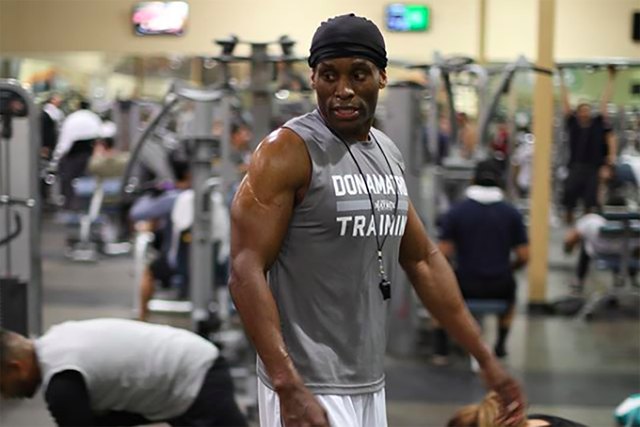 celebrity fitness trainer Don Brooks teaches a group workout