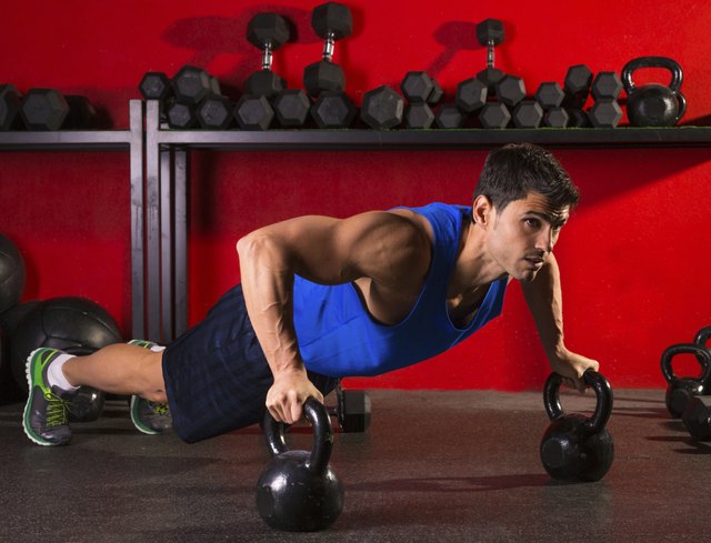 Kettlebells push-up man strength gym workout
