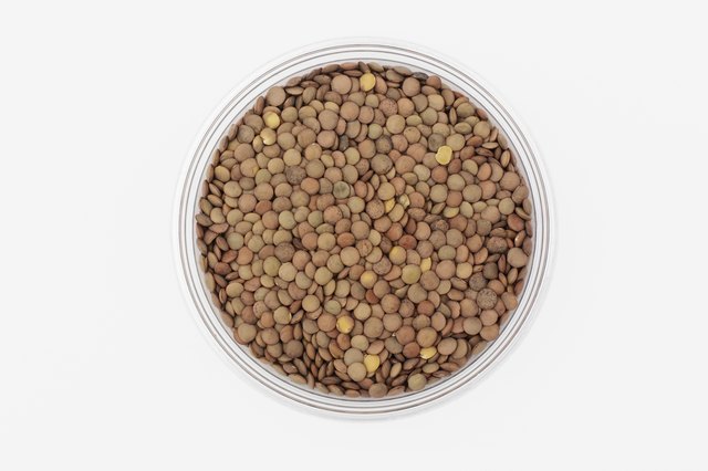 Bowl of uncooked lentils, overhead view